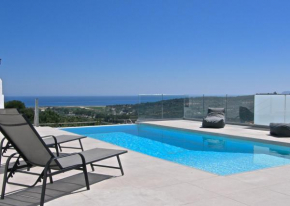 Modern villa with infinity pool close to the sea